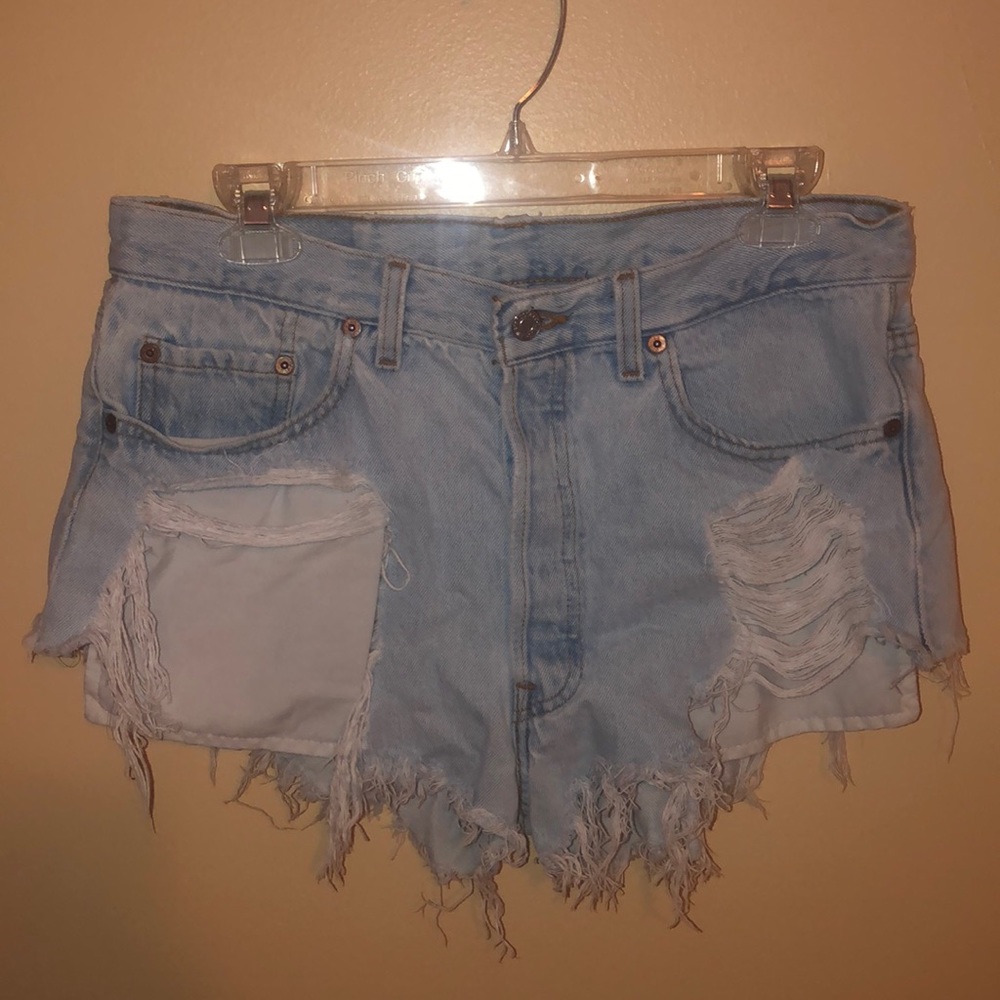 Super distressed denim shorts